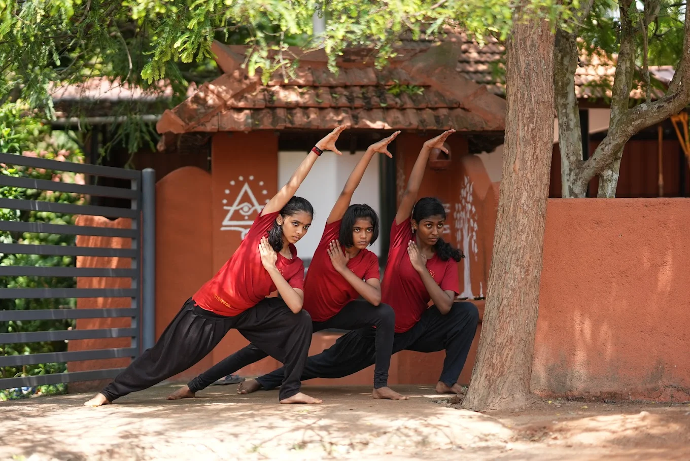 Students practicing Kalaripayattu and self-defense at Agasthyam Kalari Kerala under expert Gurukkal guidance