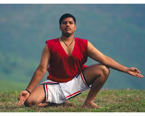 Sri Rudra C. V. N. Kalari Kottayam students practicing traditional Northern style Kalaripayattu training in a kuzhi kalari